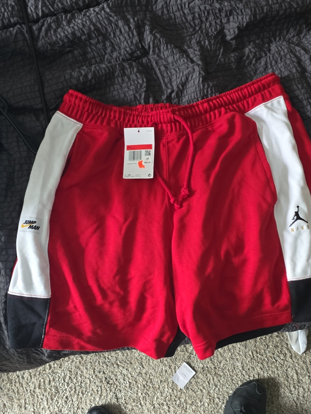 Jordan Men’s Red Athletic Shorts with White Side Panels and Black Hem